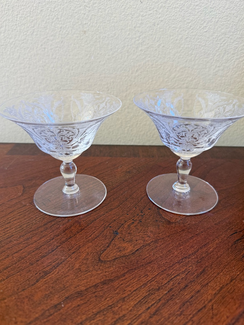 Pair of Vintage Rose point etched champagne glasses